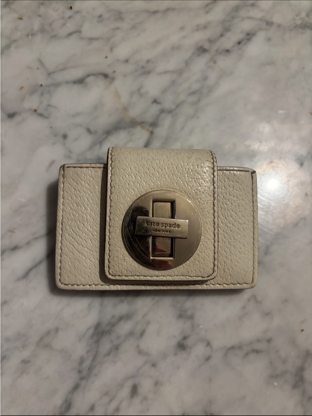 kate spade Cream Leather card case with Gold Turnlock
